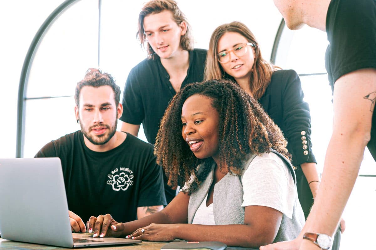 head of product. users looking at a laptop.