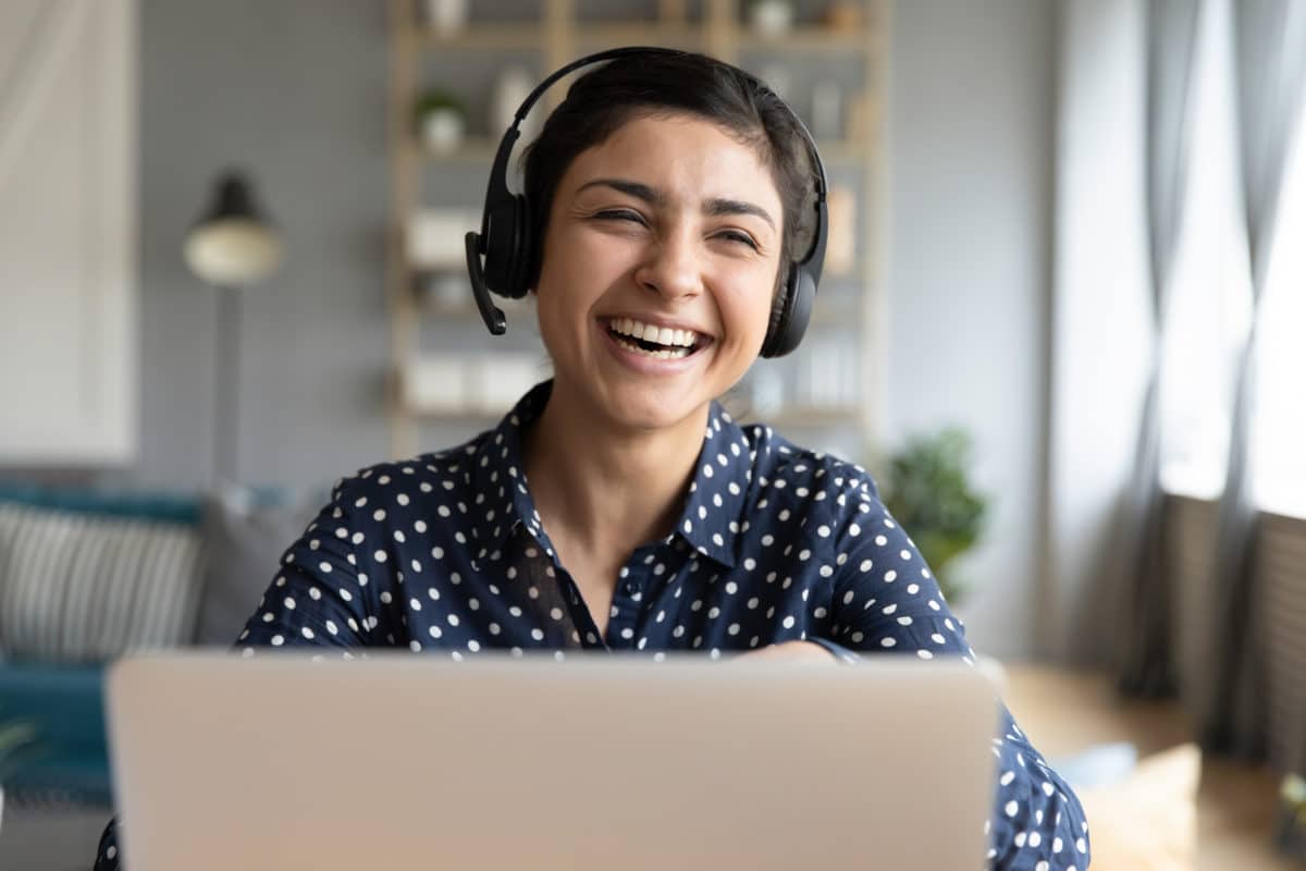 Joyful woman at a laptop