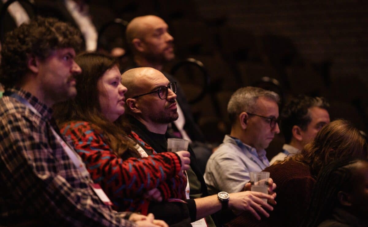 Audience sat down in theatre, listening to the speaker at Access Lab EMEA.